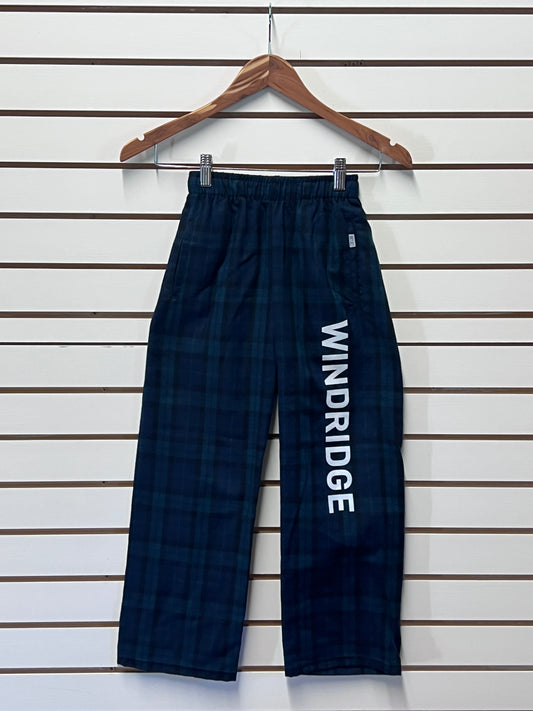 Navy blue plaid pants with 'WINDRIDGE' branding on a wooden hanger against a white background